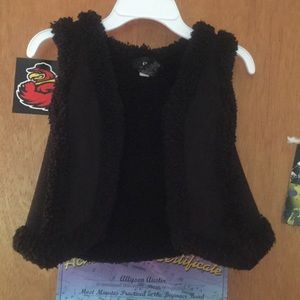 Black tank top over coat