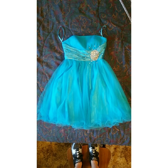 Blue short dress with clear rhinestones on waist.