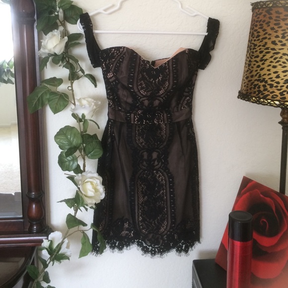 Sexy black lace patterned dress over nude colors
