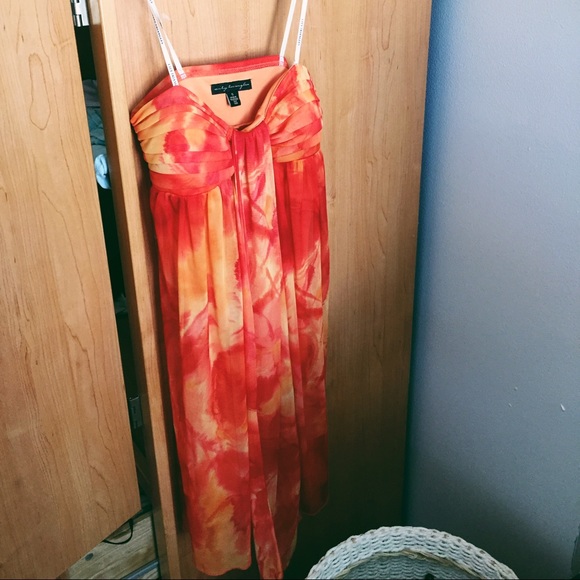 Flowy orange summer dress .