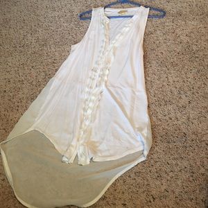 White ruffled tank top with train.