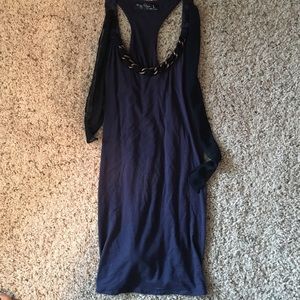 This is a blue with gold chain shirt.