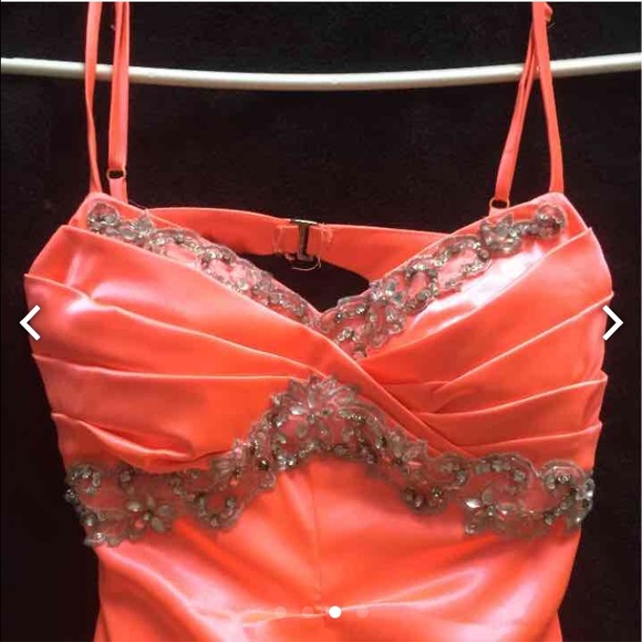 bright neon orange dress with open back