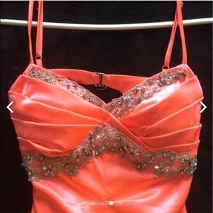 bright neon orange dress with open back