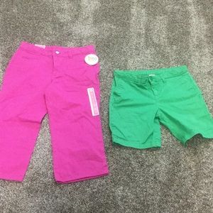 Pink Capri, green shorts. Both size 14. Pink new.