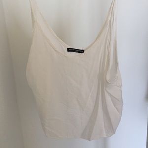 White flowy tank from Brandy Melville