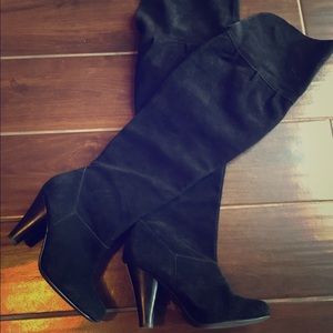 Thigh high black boots