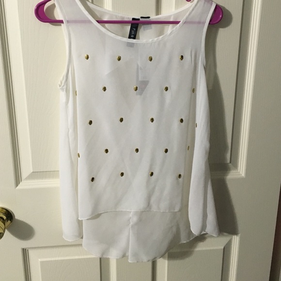 White blouse with gold skulls