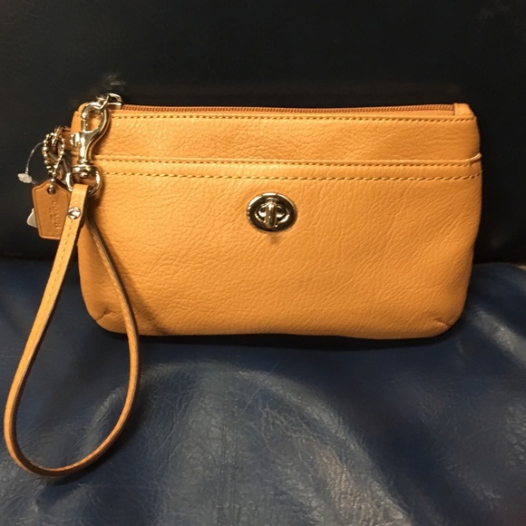 NWT Coach wristlet.