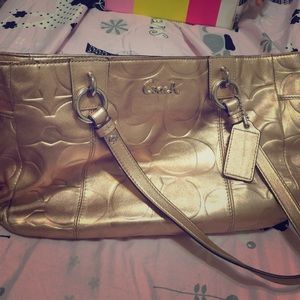 Gold coach purse with wallet