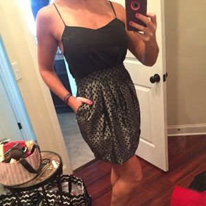 BCBG size 6 strappy black dress with skirt pockets