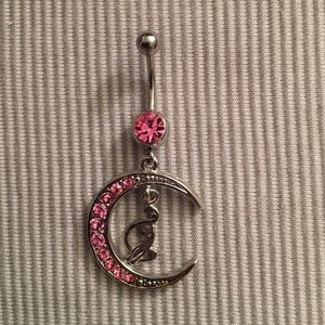 Pink baby phat belly ring.