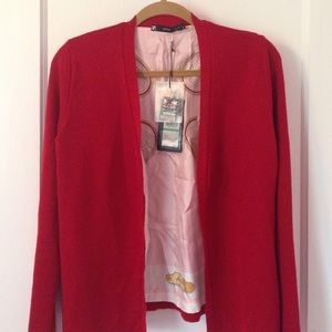 red cardigan. made in Italy.