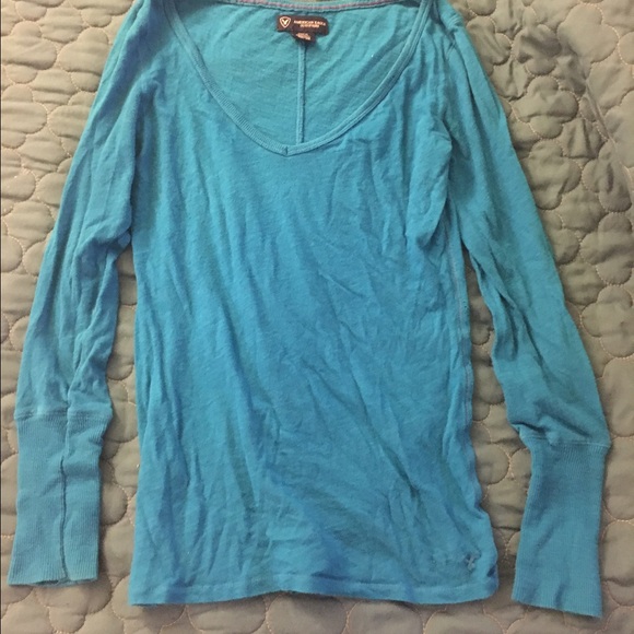 Long sleeved blue shirt