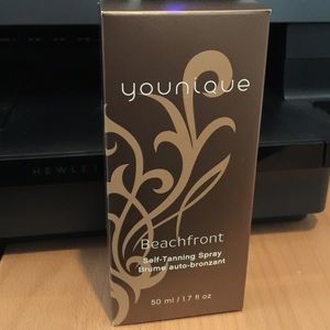 Younique self tanning spray. New in package.