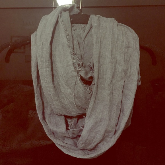 Raw edge scarf with denim coloring.