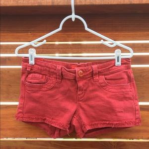 Red jean shorts.