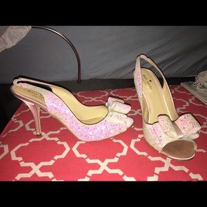 Brand new, never worn, iridescent pink.