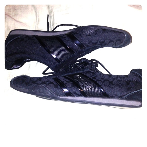 Black coach sneakers.