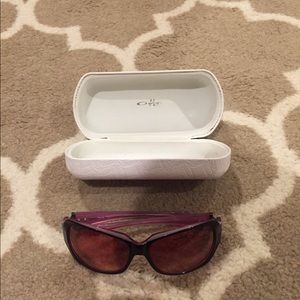 Oakley sunglasses with a pink/purple tinted lenses