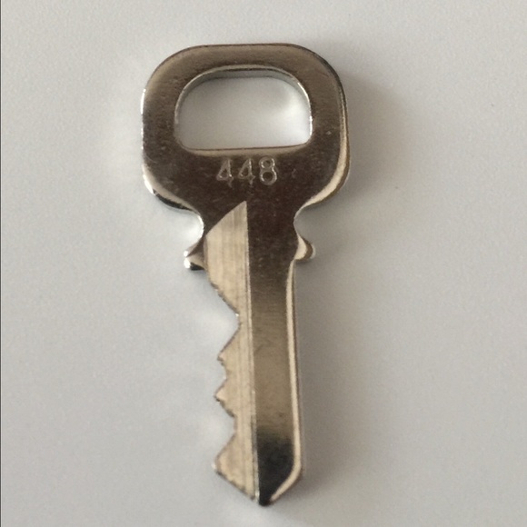 LOUIS VUITTON key for padlock number 448.