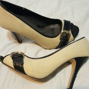 Beige and black pumps