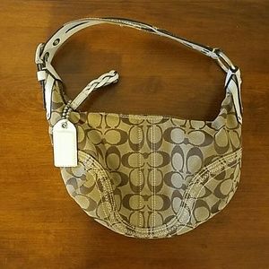 Authentic Coach Purse! Small but fits a lot!