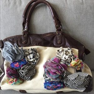 Anthropologie (Deux Lux) petal pouf bag. Gorgeous!