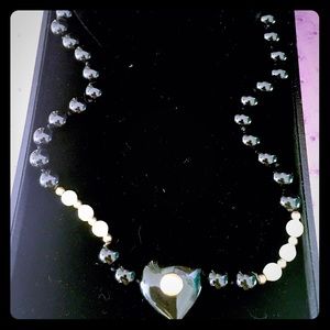 Onyx, freshwater pearl, and gold necklace