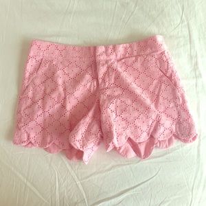 Lilly Pulitzer pink scalloped shorts.