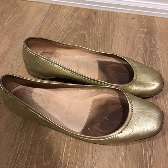 Gold Christian Louboutin flats