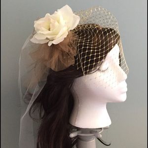 Custom gold wedding bridal veil fascinator hat.