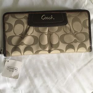 Authentic Coach wallet with tags