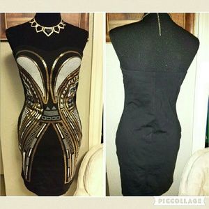 Black strapless sequince print dress.