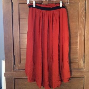 H&M Rust coloured midi skirt with black waistband