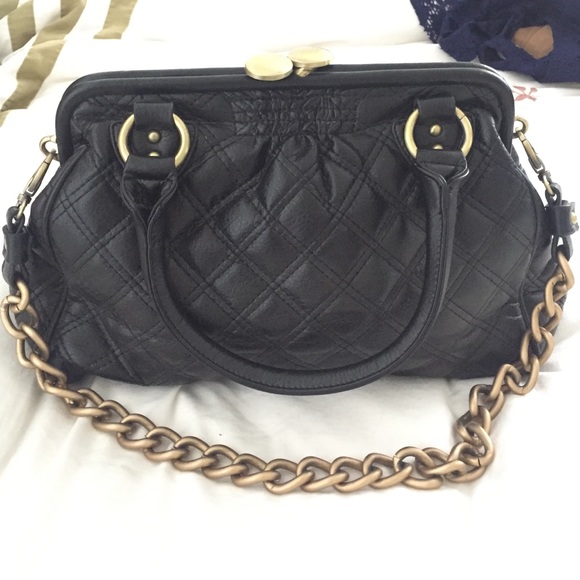 Black quilted handbag