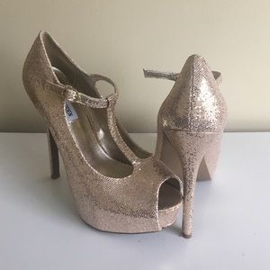 Gold open-toe Steve Madden shoes