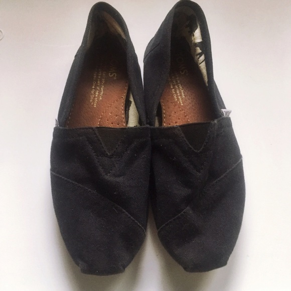 Black TOMS Classic Slip ons