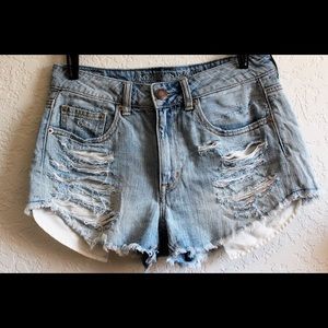 High waisted light wash distressed denim shorts
