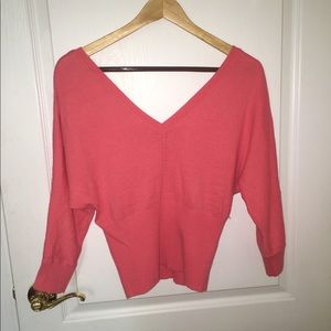 Open neck, coral blouse from Guess. 5% cashmere