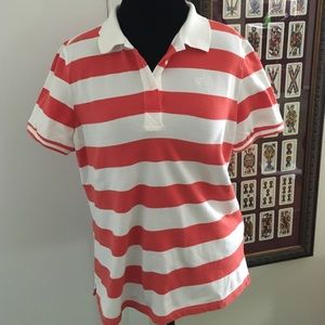 Deep coral and white polo shirt