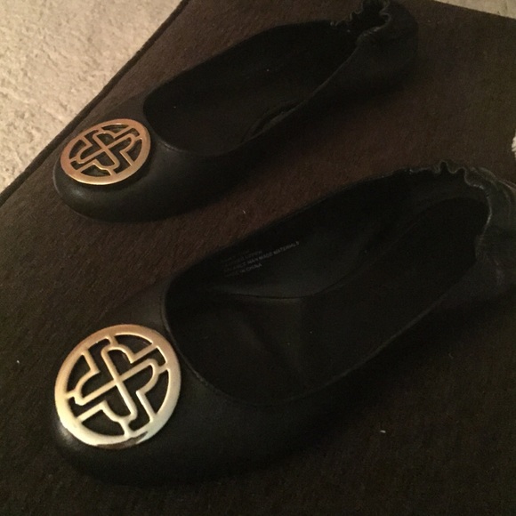 Black leather flats....