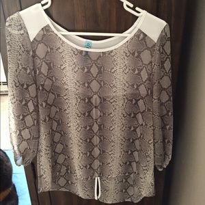 Sheer Snakeskin shirt with button up back