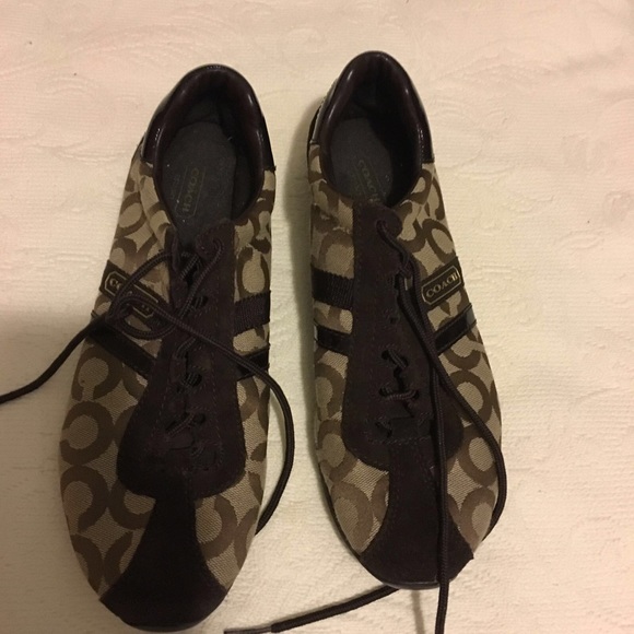 Authentic coach low top sneakers.
