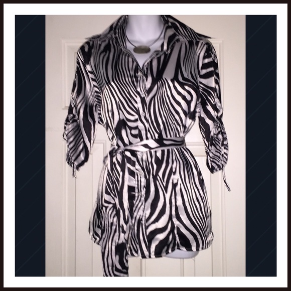 Sassy Silky Zebra Print Blouse with matching belt.