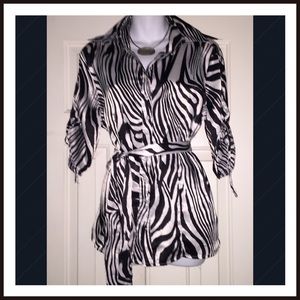 Sassy Silky Zebra Print Blouse with matching belt.
