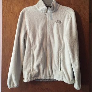 White fuzzy NorthFace jacket