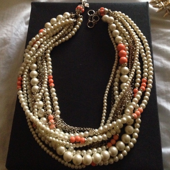 Elegant pearl necklace from banana republic .