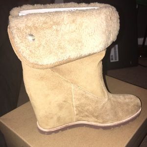Size 7.5 wedge Ugg booties.