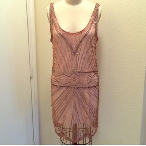 Beautiful blush color beaded dress.